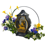 znicz z kwiatami na grób